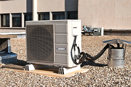 An air conditioning refrigeration unit on a roof.