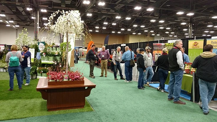 People gathered on a trade expo floor