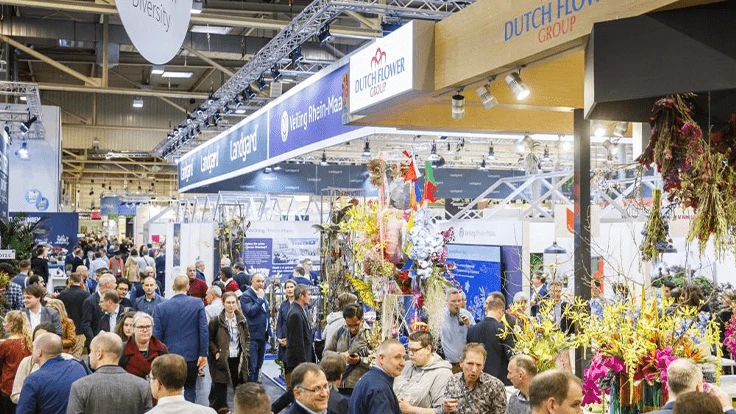 Exhibition floor with a crowd of people