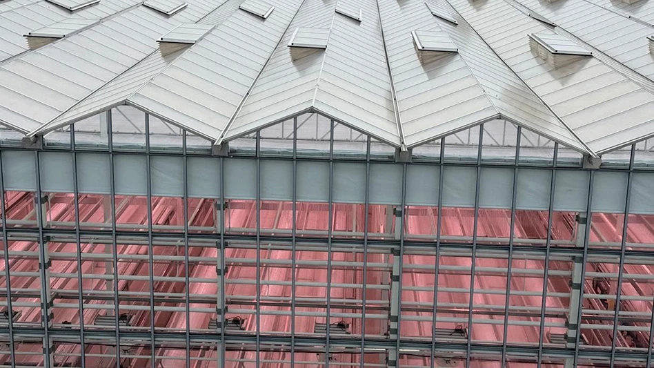 An aerial view looking into a greenhouse.