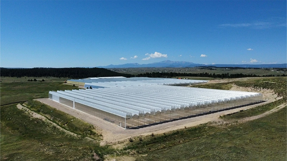 An aerial photo of a large commercial greenhouse.